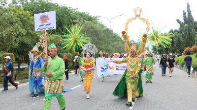 Wakil Wali Kota Bahasan Berbaur dengan Peserta Karnaval Penuh Warna dan Keceriaan